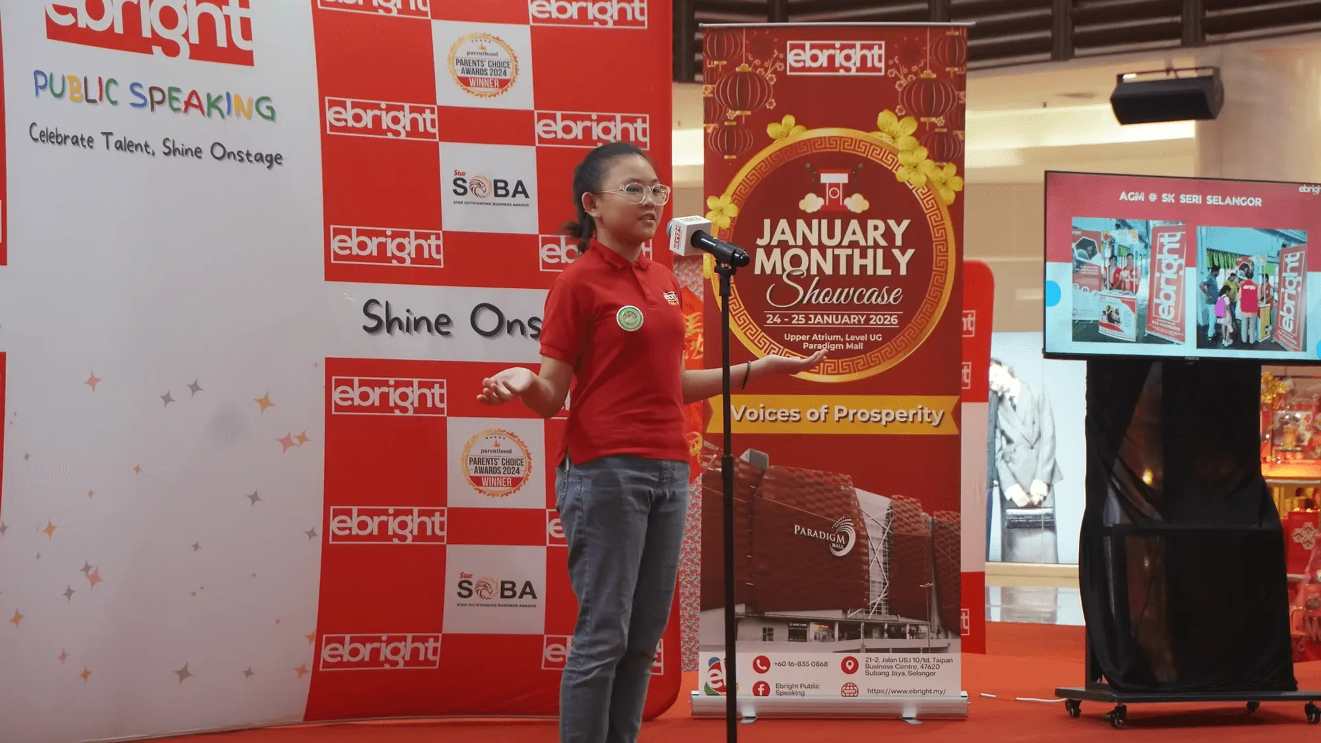 Student speaking on stage